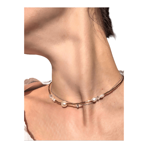 Layered pearl necklaces