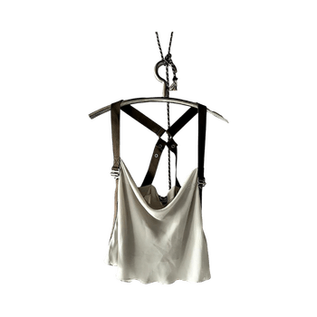 Beige sleeveless top with adjustable straps