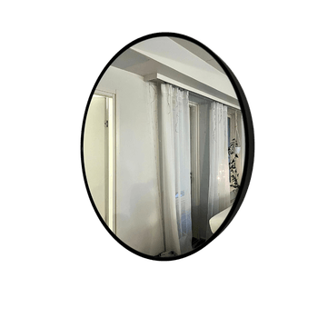 Pyöreä musta seinäpeili