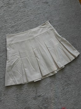 White pleated mini skirt