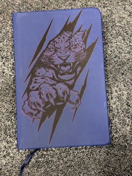 Blue notebook with panther