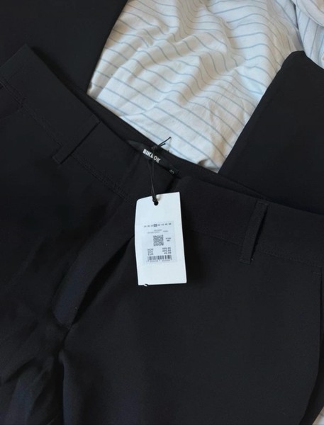Black flared trousers