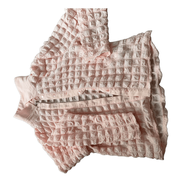 Roosa tekstuuriga pluus