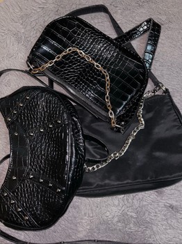 Three black handbags