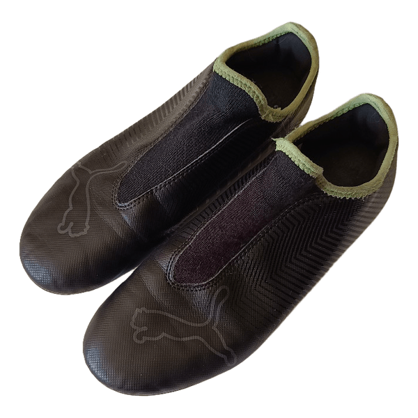 Black Puma football boots
