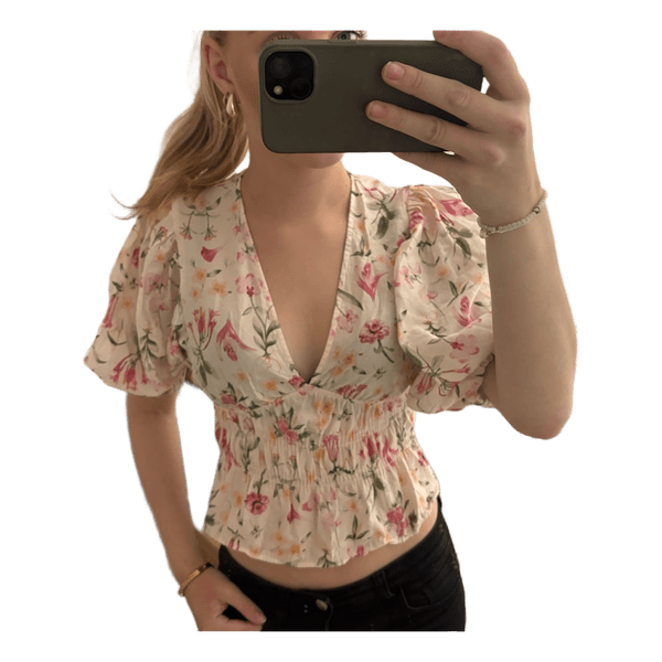 Blommig blus med puffärm