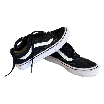 Black Vans sneakers