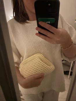 Cream crochet clutch