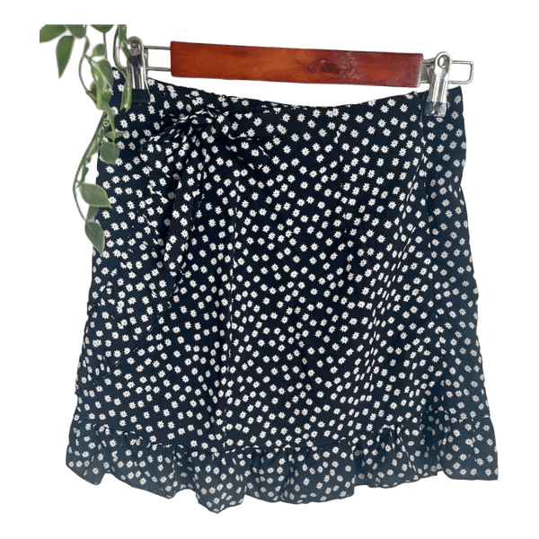 Black daisy print mini skirt