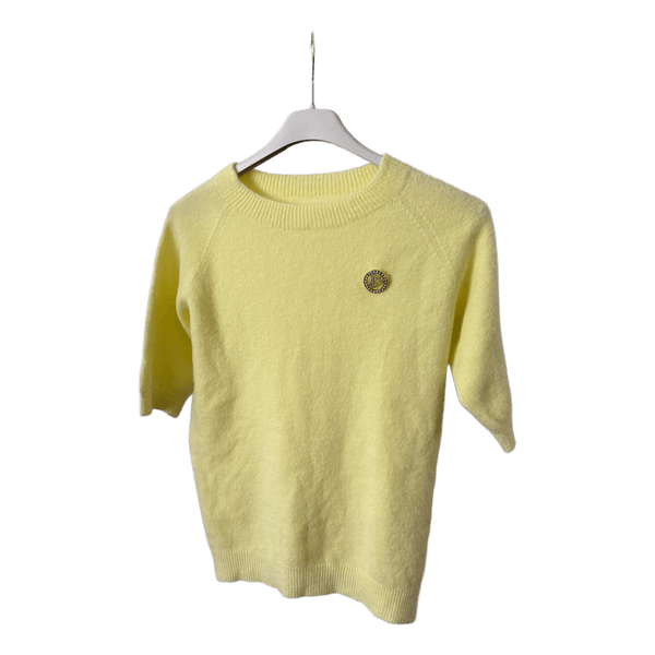 Yellow knitted sweater