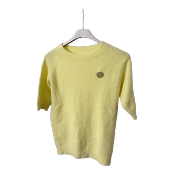 Yellow knitted sweater