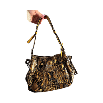 snake print guess laukku