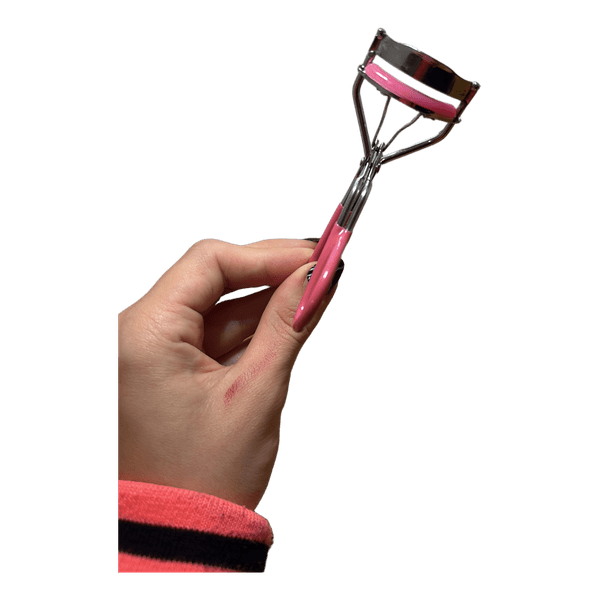 Pink eyelash curler