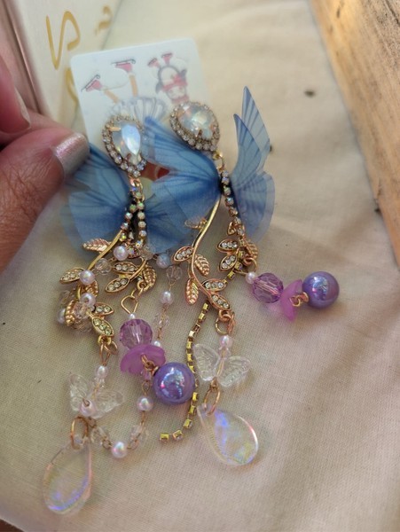 Blue butterfly dangle earrings