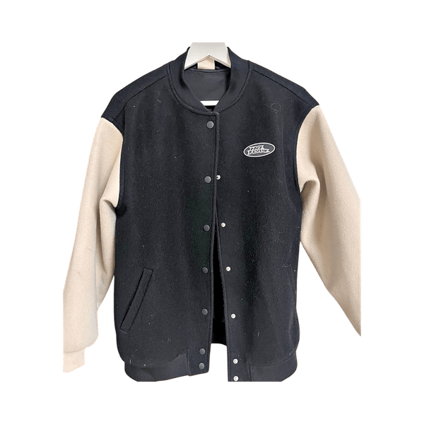 Black and beige varsity jacket