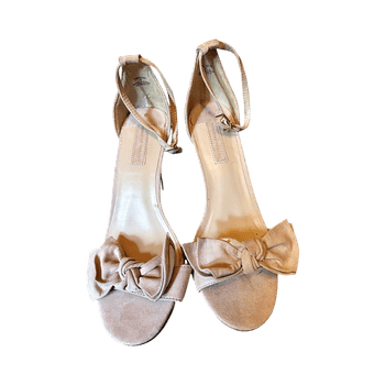 beige avokkaat rusetilla
