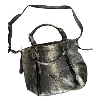 Guess käärmekuvioinen laukku