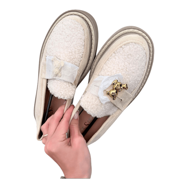 Beige shearling platform loafers