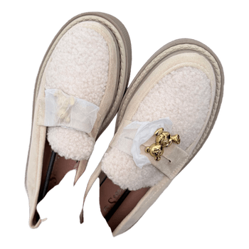 Beige shearling platform loafers