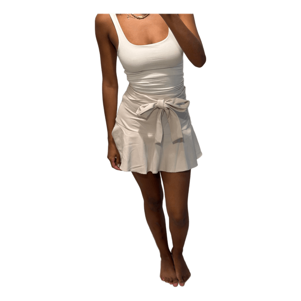 Beige minihame rusetilla