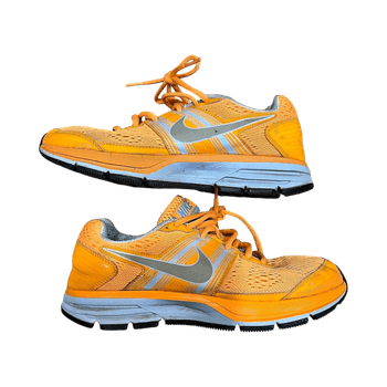 Oranži Nike sporta apavi