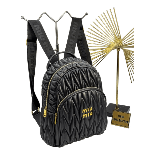 Black quilted Miu Miu backpack