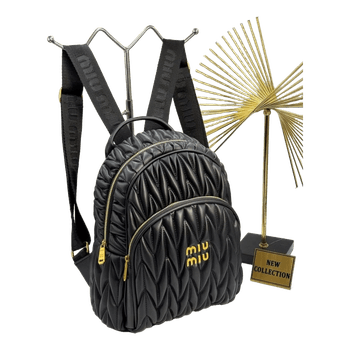 Black quilted Miu Miu backpack