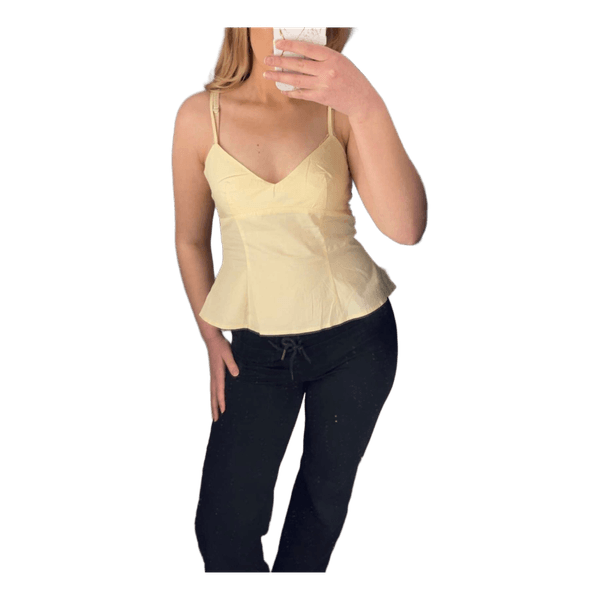 Vaaleankeltainen peplum-toppi