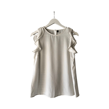 Valkoinen frillatoppi / röyhelötoppi