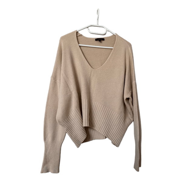 Beige knit sweater with trousers