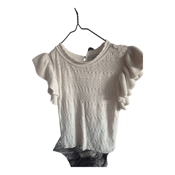 White patterned top