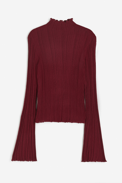 Red ribbed turtleneck sweater