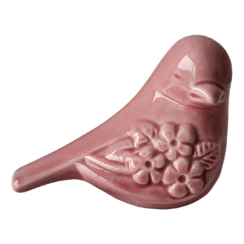 Pink ceramic bird figurine