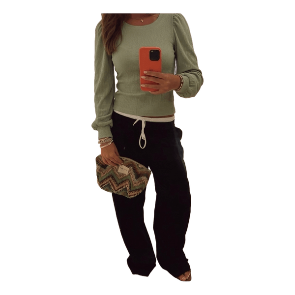 Green long-sleeved top