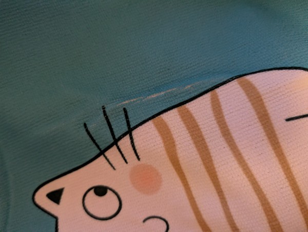 Cat patterned blue and yellow kitchen towel