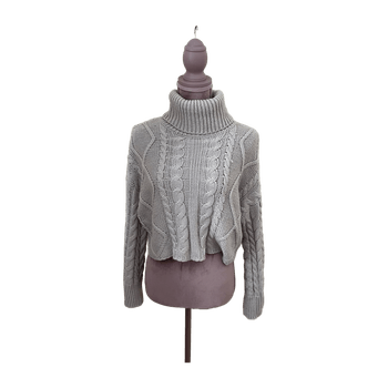 Beige cable knit turtleneck sweater