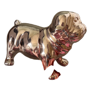 Kultainen koirafiguuri