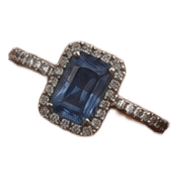 Blue gemstone halo ring