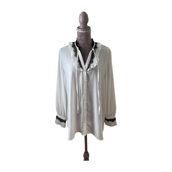 Sheer white blouse with lace details