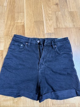 Black denim shorts