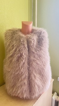 Beige faux fur vest