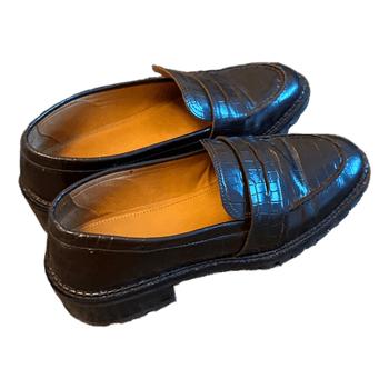 Ruskeat krokokuvioiset loaferit