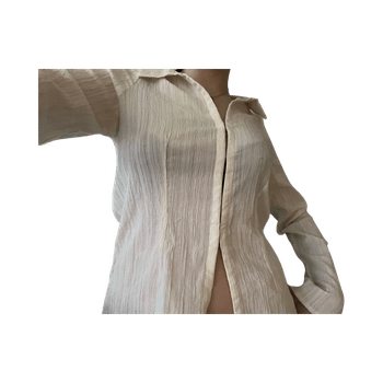 valkoinen rypytetty paitapusero