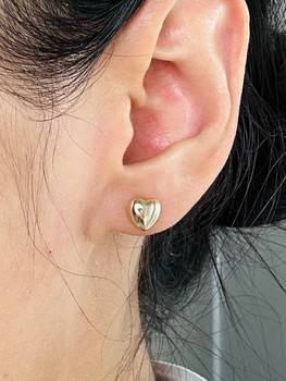 Gold heart stud earrings