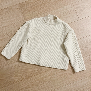 H&M neule koristehelmillä