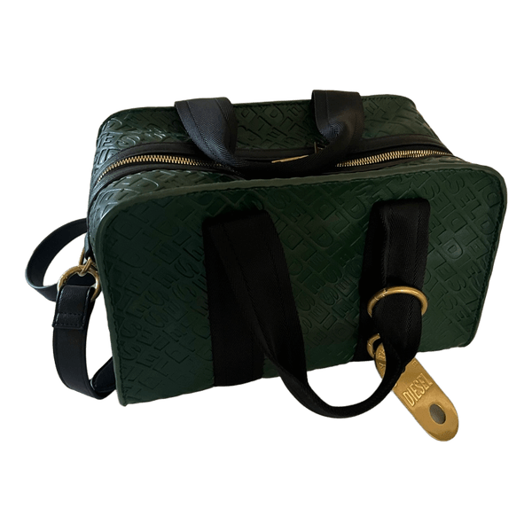 Green embossed leather handbag
