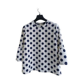 Pilkkukuvioinen pusero