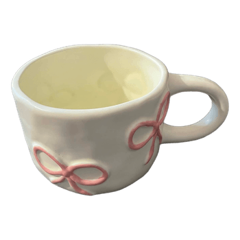 White ceramic bow mug