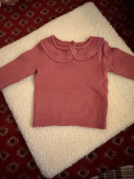 Pink knitted sweater