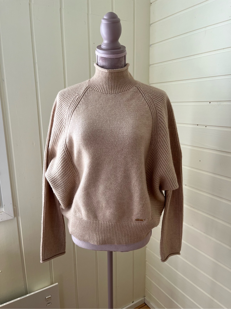 Beige knitted turtleneck jumper